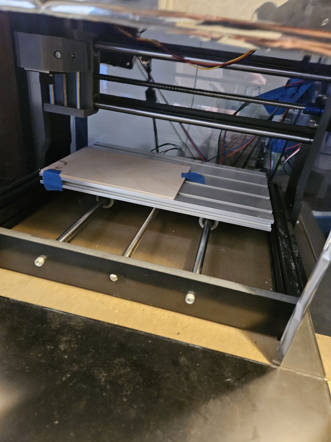 Close-up of laser or CNC bed and rails