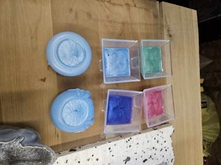 Top view of resin pours in square molds